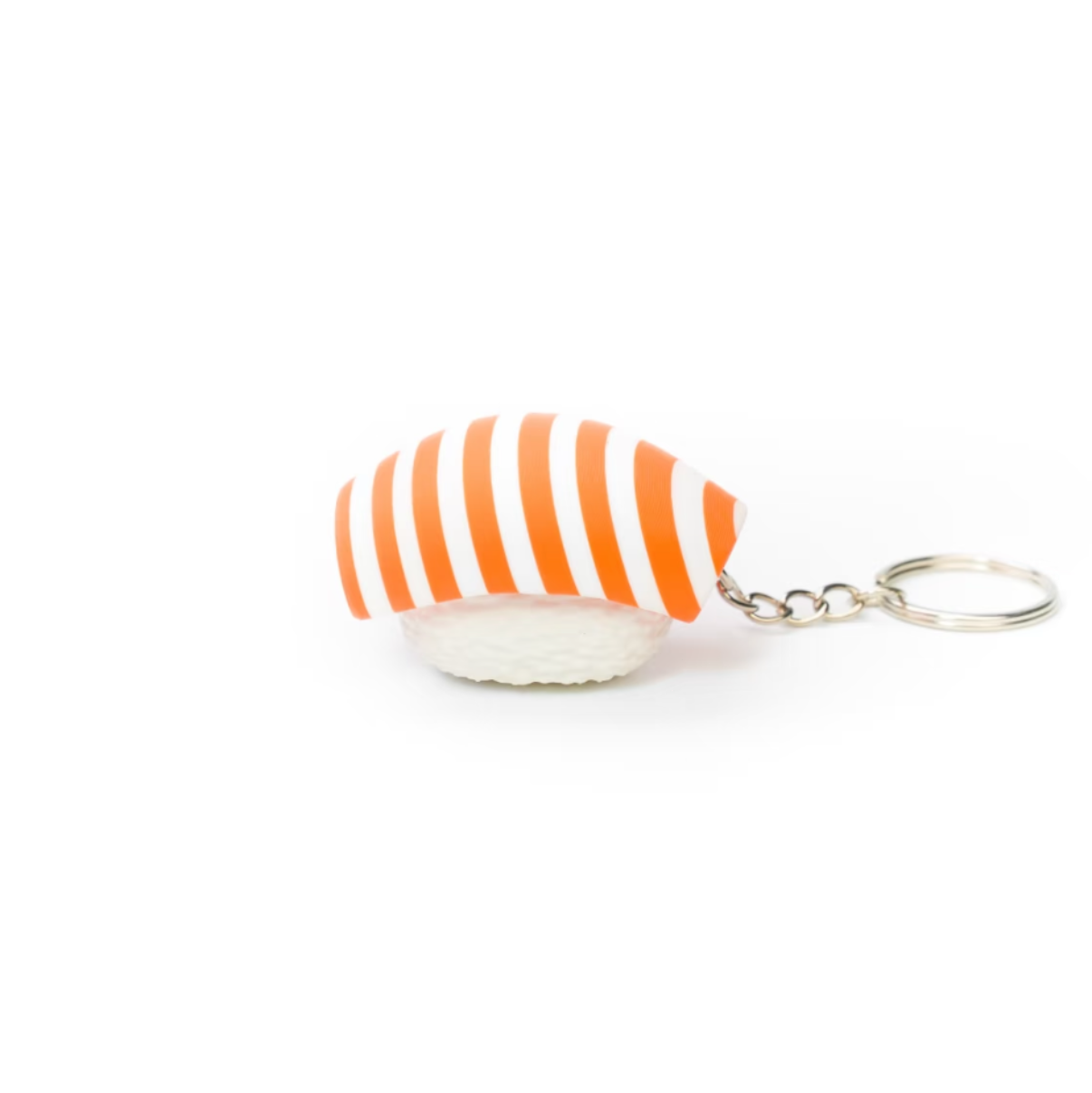 A small sushi-shaped keychain charm with orange and white striped rice and a white filling, attached to a silver metal key ring, shown on a plain white background.