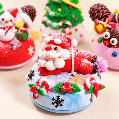 Close-up of Santa music box clay figure, candy canes, holly and snow-effect decorations